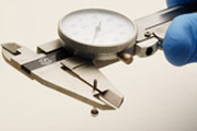 Measuring a Barbell's Gauge with Dial Calipers.